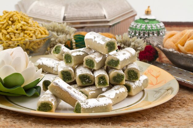 Kaju pista roll served on a plate