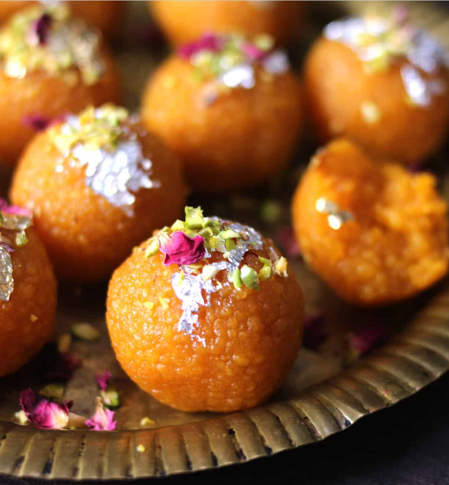 Macro close-up of a golden motichoor ladoo